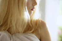 close up profile of woman's mouth, chin, shoulder - Alex Mares-Manton