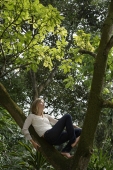 young girl in tree - Alex Mares-Manton