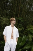 portrait of young man wearing all white - Alex Mares-Manton