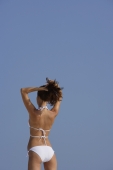 back view of woman in white bikini - Alex Mares-Manton