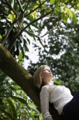 teen girl in tree - Alex Mares-Manton
