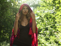 Young woman wearing scarf over head - Alex Hajdu