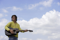 young man playing guitar - Alex Mares-Manton