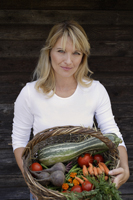 woman with basket of garden vegetables - Alex Mares-Manton