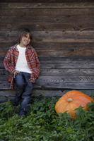 boy next to huge pumpkin - Alex Mares-Manton