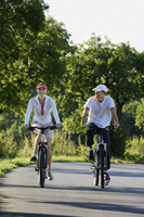 Couple riding bicycles - Alex Mares-Manton