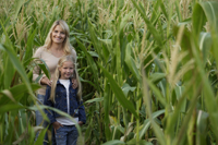 mother and daughter in corn field - Alex Mares-Manton