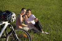 Young couple resting from bike ride - Alex Mares-Manton