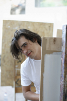 artist working in studio - Dennison Bertrand