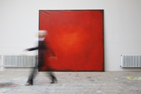 woman walking by red painting - Dennison Bertrand