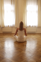 Young woman doing yoga - Alex Mares-Manton