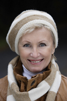 Portrait of senior woman in hat and scarf - Alex Mares-Manton