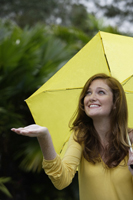 Young woman with yellow umbrella - Alex Mares-Manton