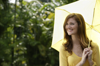 Young woman with yellow umbrella - Alex Mares-Manton