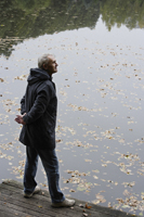 Senior man overlooking pond - Alex Mares-Manton