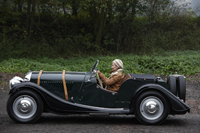 Profile of senior woman in antique car - Alex Mares-Manton