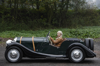 Woman driving antique car - Alex Mares-Manton