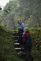 Senior couple walking up steps - Alex Mares-Manton