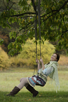 Young woman in tree swing - Alex Mares-Manton