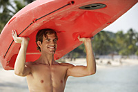 man with red kayak on head - Alex Mares-Manton