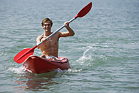 young man kayaking - Alex Mares-Manton