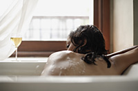 Woman in bathtub, glass of wine - Alex Mares-Manton