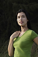 portrait of woman wearing green shirt - Nugene Chiang