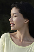 profile of woman wearing yellow shirt - Nugene Chiang