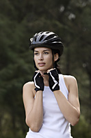 young woman wearing biking helmet - Nugene Chiang