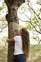 girl hugging tree - Nugene Chiang