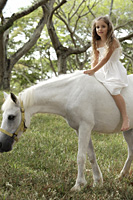 young girl riding bareback on pony - Nugene Chiang