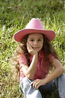 young girl with pink cowboy hat - Nugene Chiang