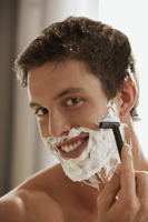 Young man shaving - Alex Mares-Manton