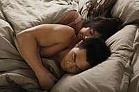 man and woman in bed together - Nugene Chiang