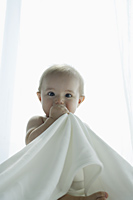 baby holding blanket - Alex Mares-Manton