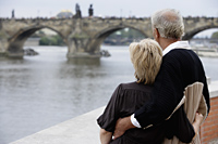 rear view of mature couple looking at bridge - Alex Hajdu