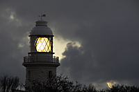 Lighthouse with clouds as background - Alex Mares-Manton