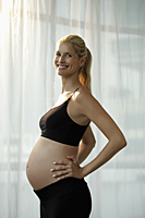 pregnant woman smiling at camera - Alex Mares-Manton