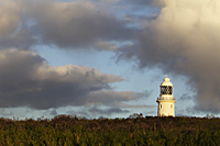 Light house with clouds as background - Alex Mares-Manton